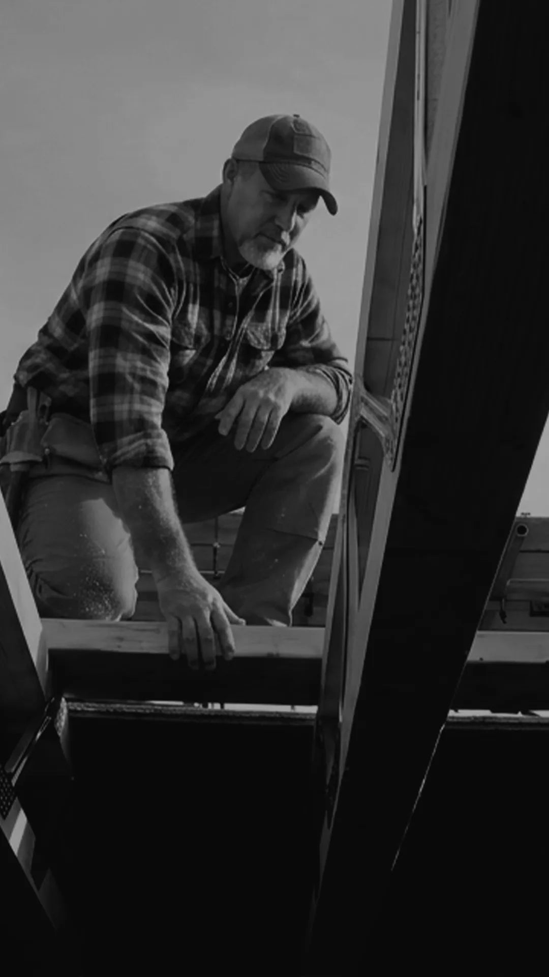 E4E homepage hero — carpenter
