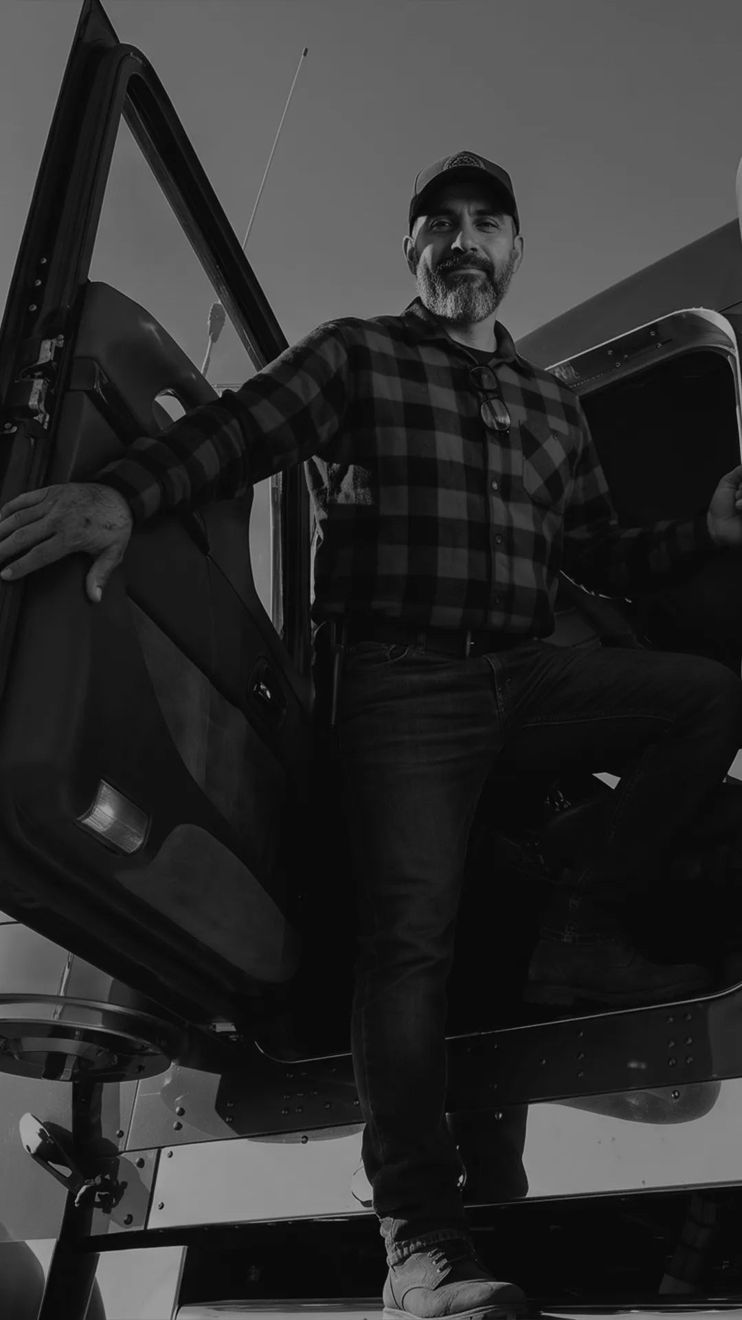 E4E homepage hero — trucker